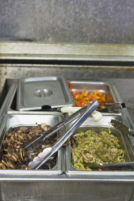 Behind the scenes in a restaurant kitchen in Tucson, Arizona photographed for Tucson Guide Magazine feature article.