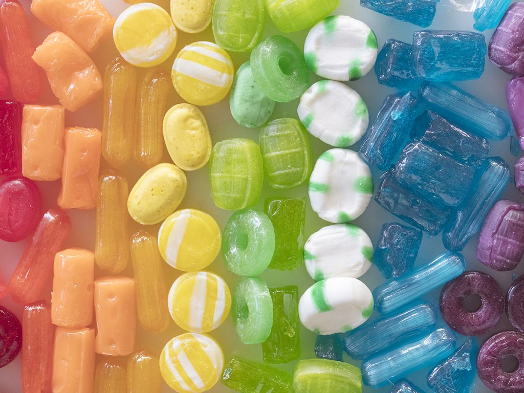 rows of hard candy in rainbow colors